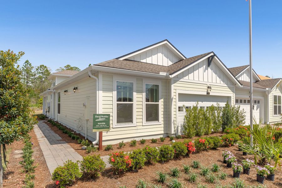Front exterior of a home in the Westerly Park at Wildlight – Villa Collection community, located in Yulee, FL (Image 10). Front exterior of a home in the Westerly Park at Wildlight – Villa Collection community, located in Yulee, FL (Image 10).