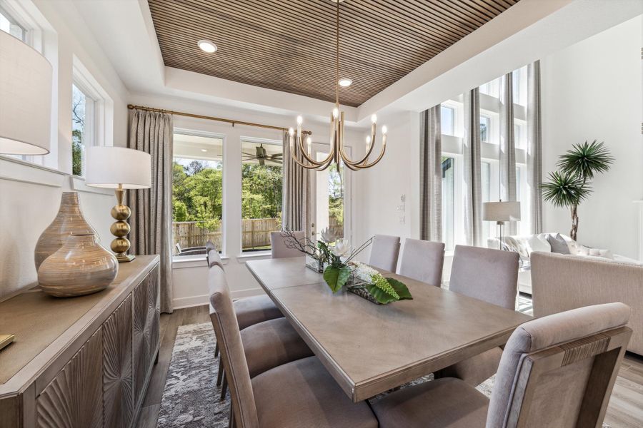 Furnished interior in a model home at The Woodlands Hills – 55' in Willis (Image 8).