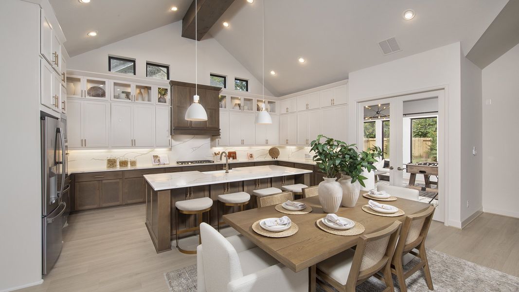 Furnished interior in a model home at The Highlands 65' in Porter (Image 16).