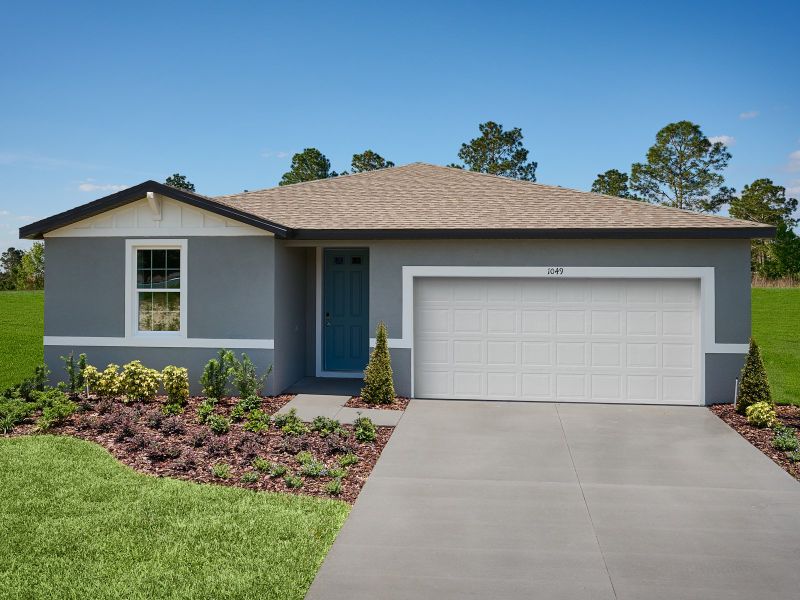 Front exterior of a home in the The Reserve at Van Oaks community, located in Auburndale, FL (Image 2).