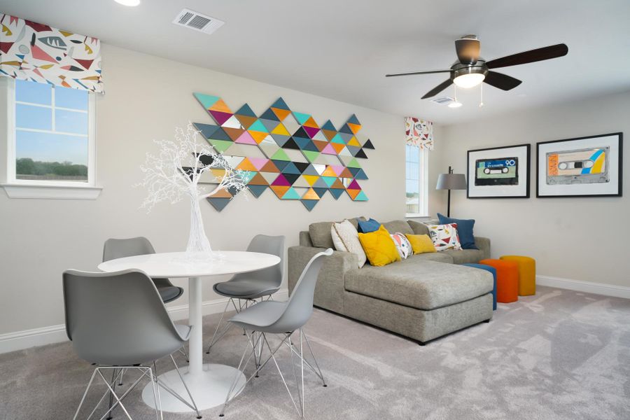 Furnished interior in a model home at Cloverleaf in Austin (Image 62).