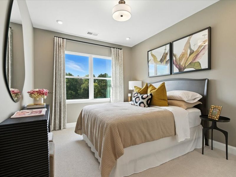 Furnished interior in a model home at Southbridge in Fort Mill (Image 10).