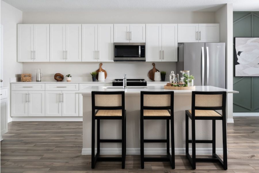 Furnished interior in a model home at Villa Mar in Winter Haven (Image 5).