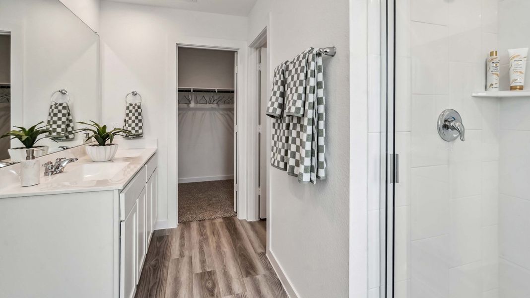 Furnished interior in a model home at Grand West in Houston (Image 18).