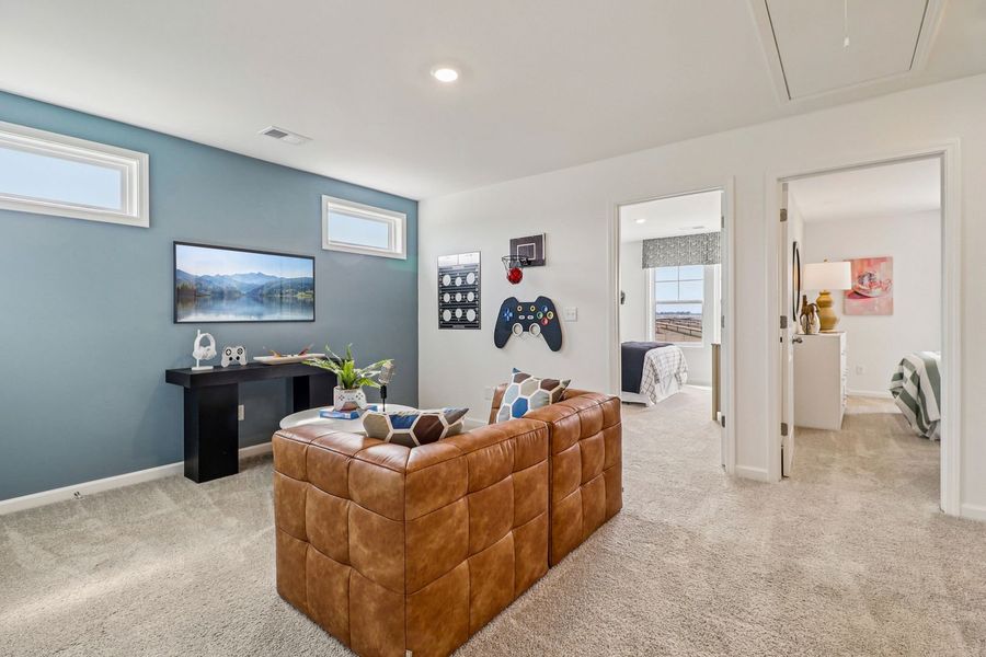 Furnished interior in a model home at Old Charleston Acres in Pelion (Image 11).