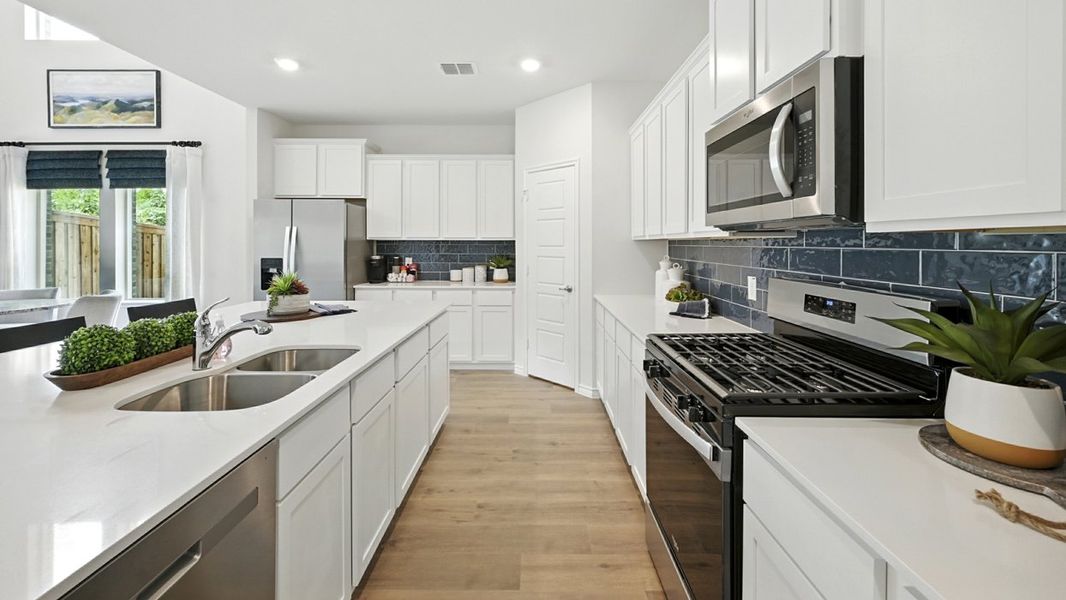 Furnished interior in a model home at Lilybrooke at Legacy Hills in Celina (Image 18).