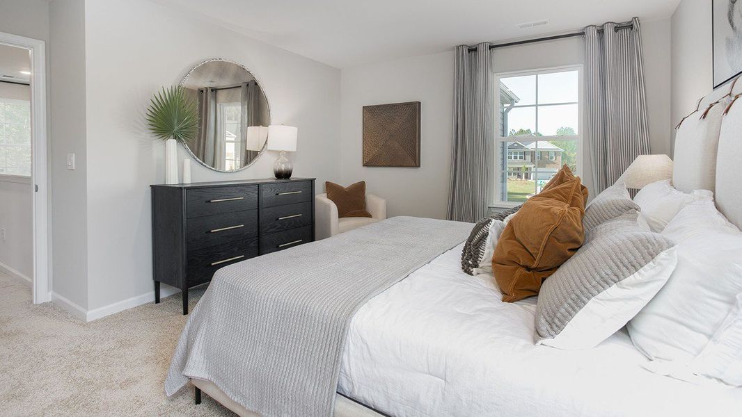 Furnished interior in a model home at Faircrest in Greensboro (Image 16).