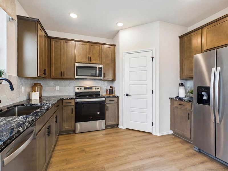 Furnished interior in a model home at Meadows at Oak Creek in San Antonio (Image 7). Furnished interior in a model home at Meadows at Oak Creek in San Antonio (Image 7).