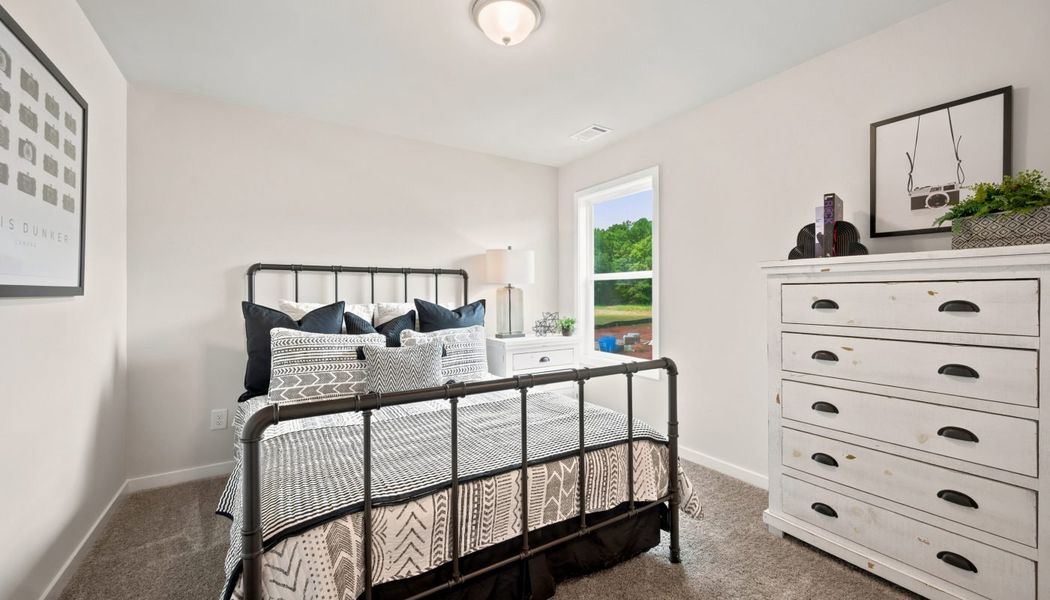 Furnished interior in a model home at Greenefield in Cartersville (Image 41).