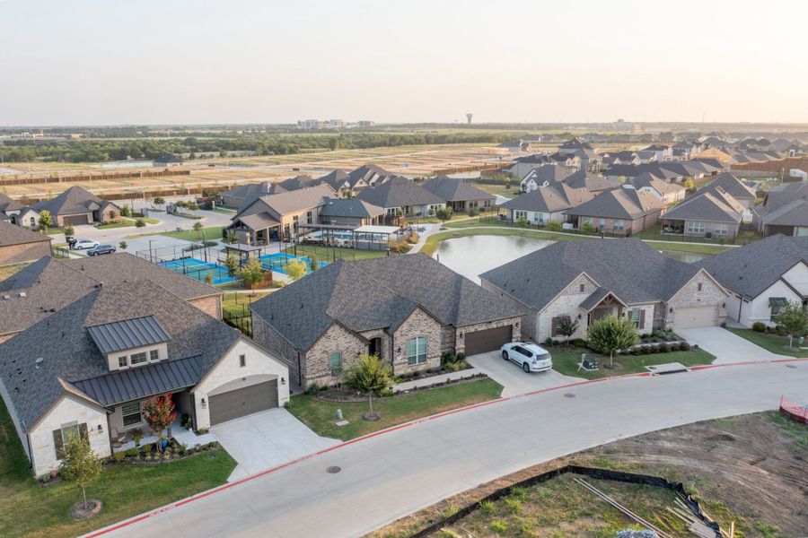 Aerial view of the Ladera at the Reserve community in Mansfield, TX, showing layout and nearby surroundings (Image 1). Aerial view of the Ladera at the Reserve community in Mansfield, TX, showing layout and nearby surroundings (Image 1).