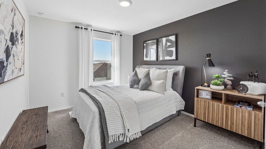 Furnished interior in a model home at Palomino in Manor (Image 30).