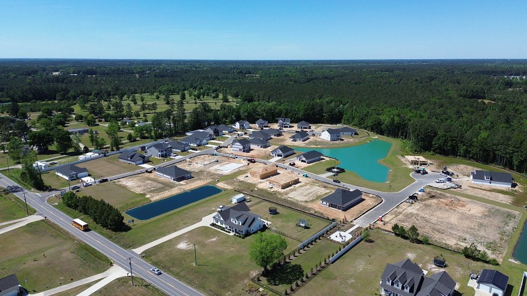 Aerial view of the Coastal Farms community in Conway, SC, showing layout and nearby surroundings (Image 1). Aerial view of the Coastal Farms community in Conway, SC, showing layout and nearby surroundings (Image 1).