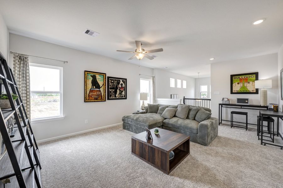 Furnished interior in a model home at La Segarra in Brookshire (Image 8).
