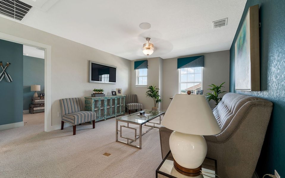 Furnished interior in a model home at Hunter's Ranch in San Antonio (Image 31).