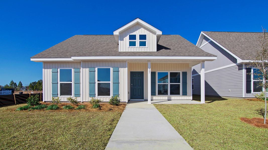 Front exterior of a home in the Owl's Head East community, located in Freeport, FL (Image 9).