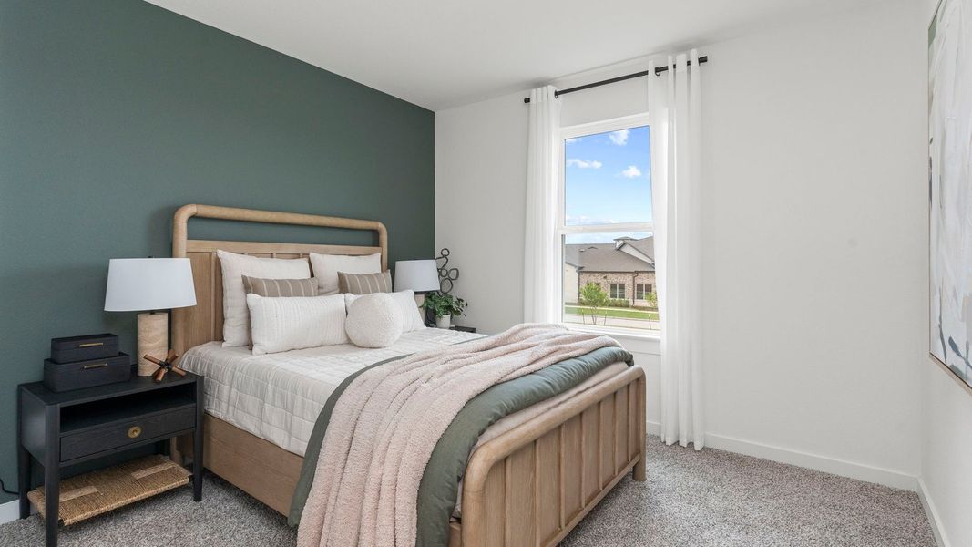 Furnished interior in a model home at Villarosa at Tamarron in Katy (Image 36).