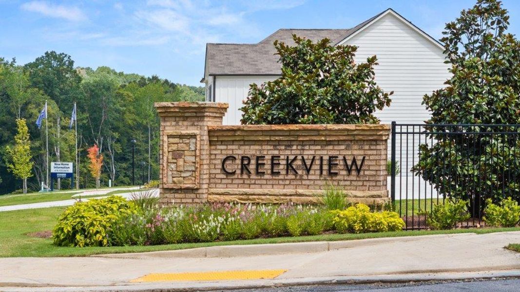 Entrance to the Creekview community in Atlanta, GA, featuring signage and landscaping (Image 2). Entrance to the Creekview community in Atlanta, GA, featuring signage and landscaping (Image 2).