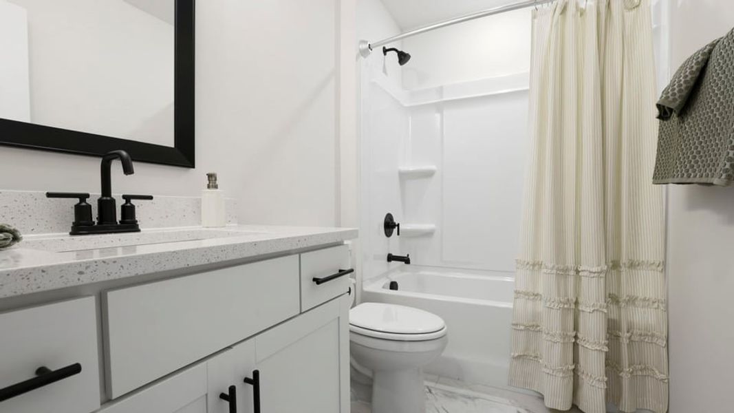 Furnished interior in a model home at Sycamore Cove in Woodruff (Image 23).