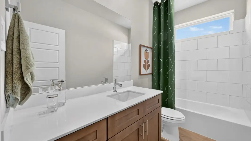 Furnished interior in a model home at Wildflower Ranch in Justin (Image 39).