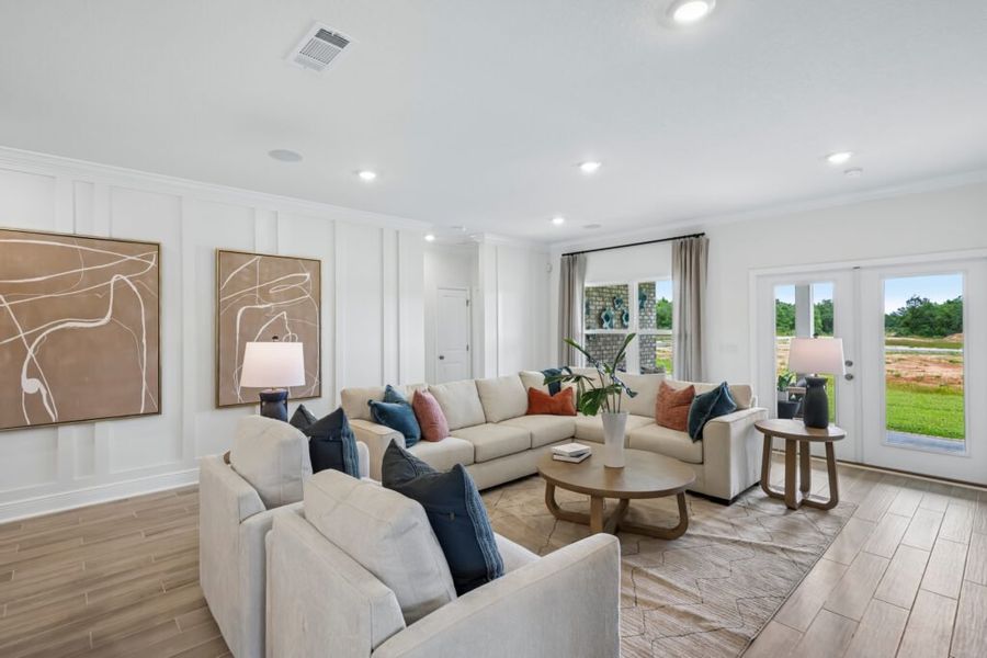 Furnished interior in a model home at Mahogany At Jubilee in Pace (Image 26).