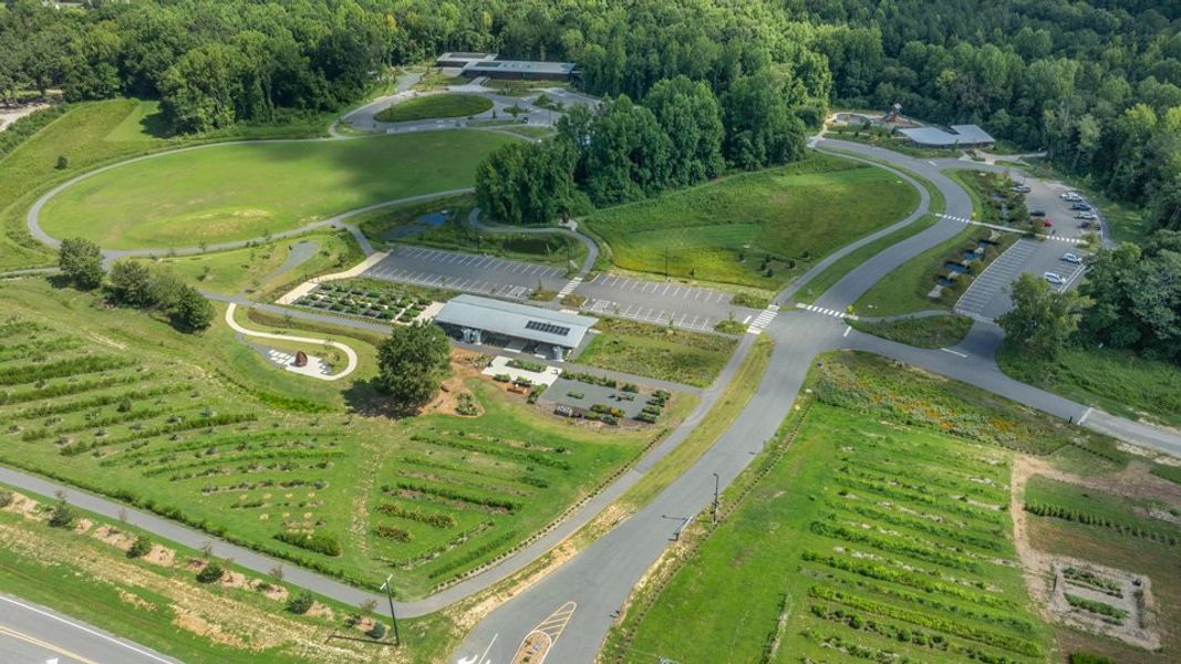 Aerial view of the The Townes at Bexford community in Willow Spring, NC, showing layout and nearby surroundings (Image 15).
