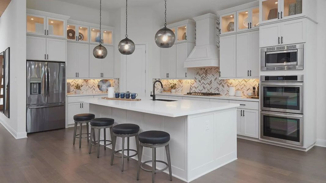 Furnished interior in a model home at Anthem in Kyle (Image 13).