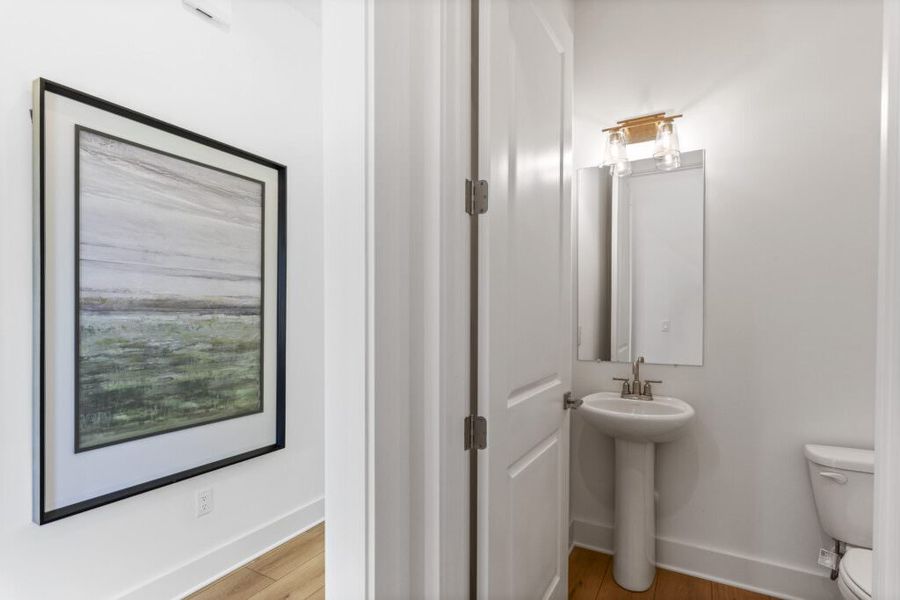 Furnished interior in a model home at Brizo in Santa Rosa Beach (Image 34).