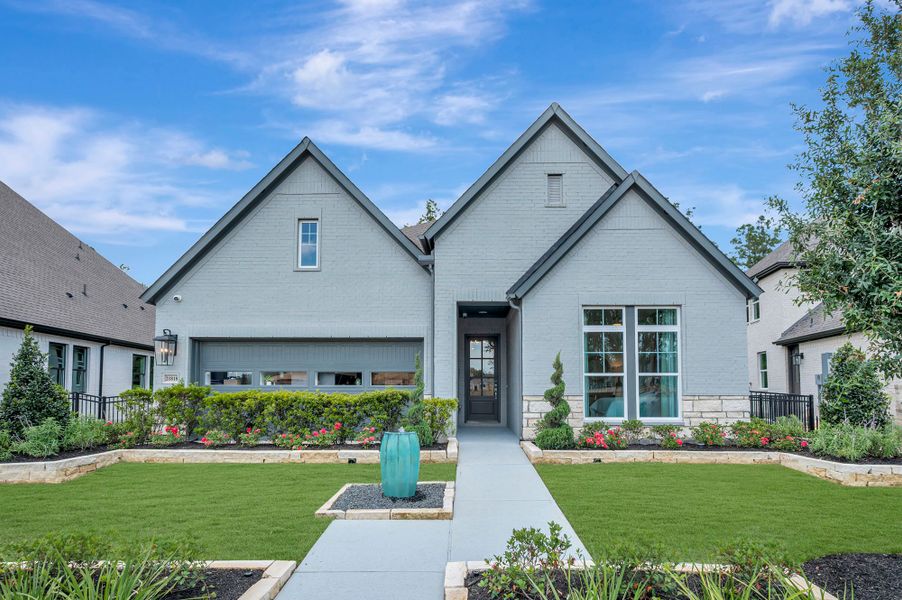 Front exterior of a home in the The Highlands Encore - Tranquil Collection community, located in Porter, TX (Image 3). Front exterior of a home in the The Highlands Encore - Tranquil Collection community, located in Porter, TX (Image 3).