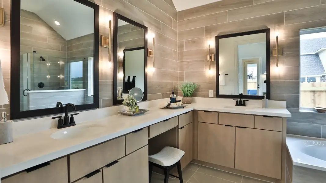 Furnished interior in a model home at Wildrye in Waller (Image 6).