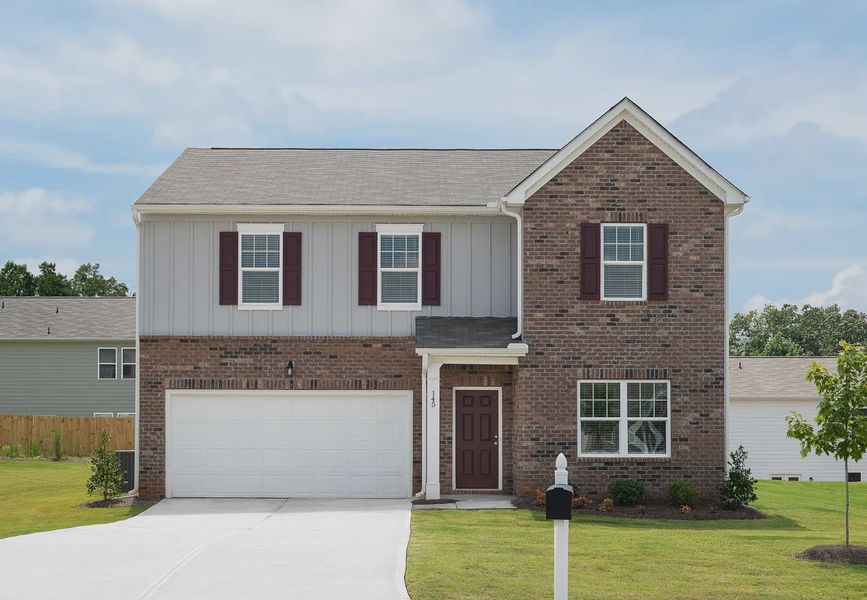 Front exterior of a home in the The Point community, located in Rolesville, NC (Image 5).