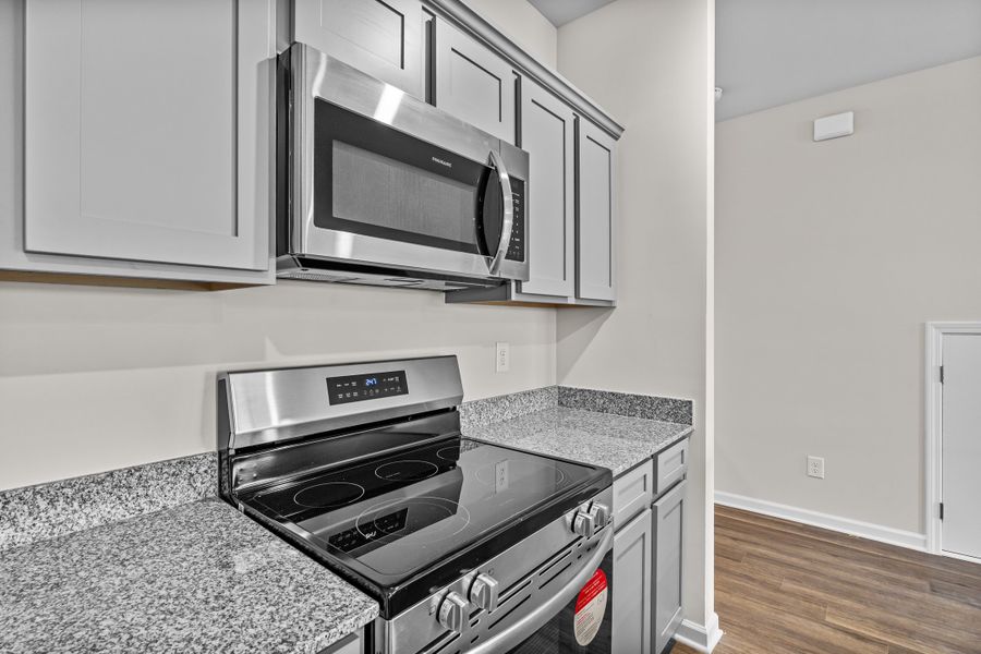 Furnished interior in a model home at Hunters Branch Townhomes in Hopkins (Image 6).