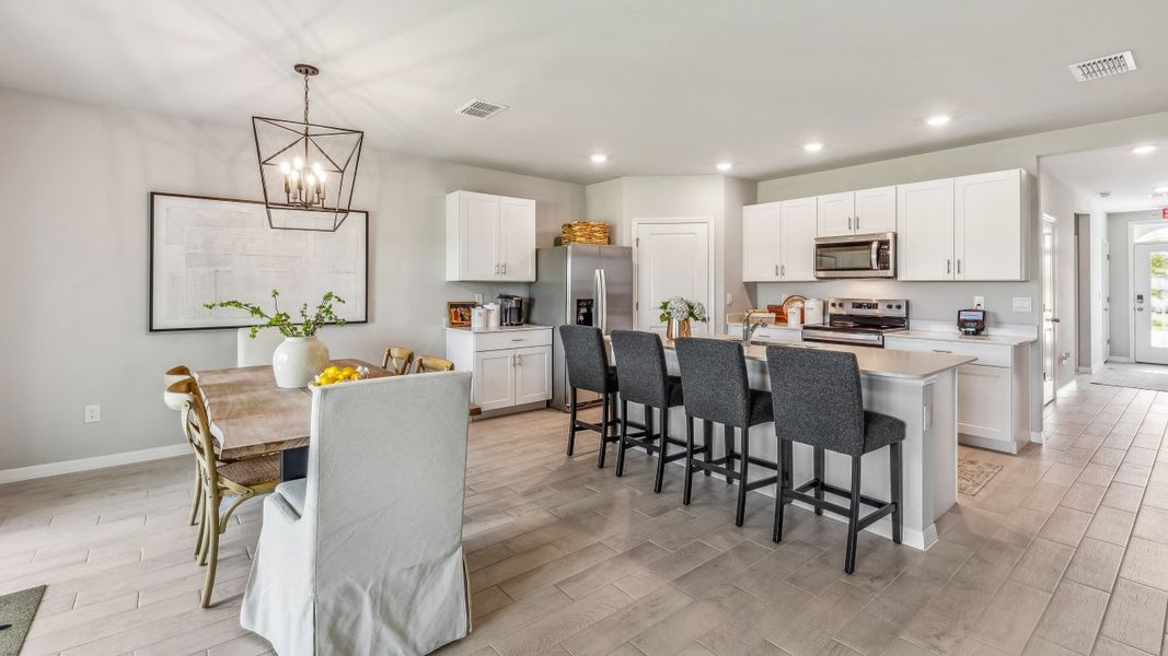 Furnished interior in a model home at Cali Cove in Punta Gorda (Image 4).