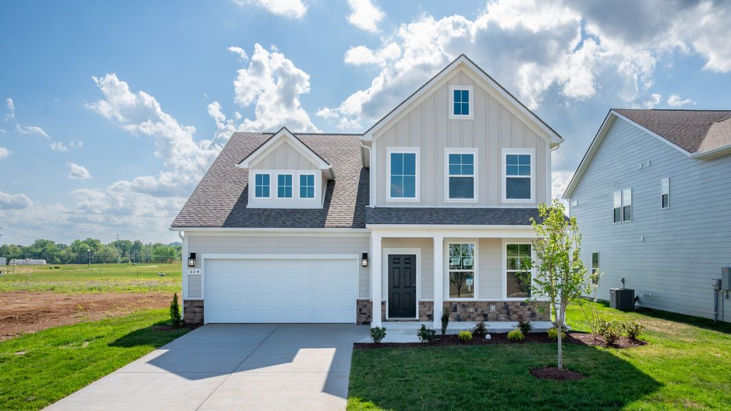 Front exterior of a home in the Cottages of Bearwood community, located in Mount Pleasant, TN (Image 10).