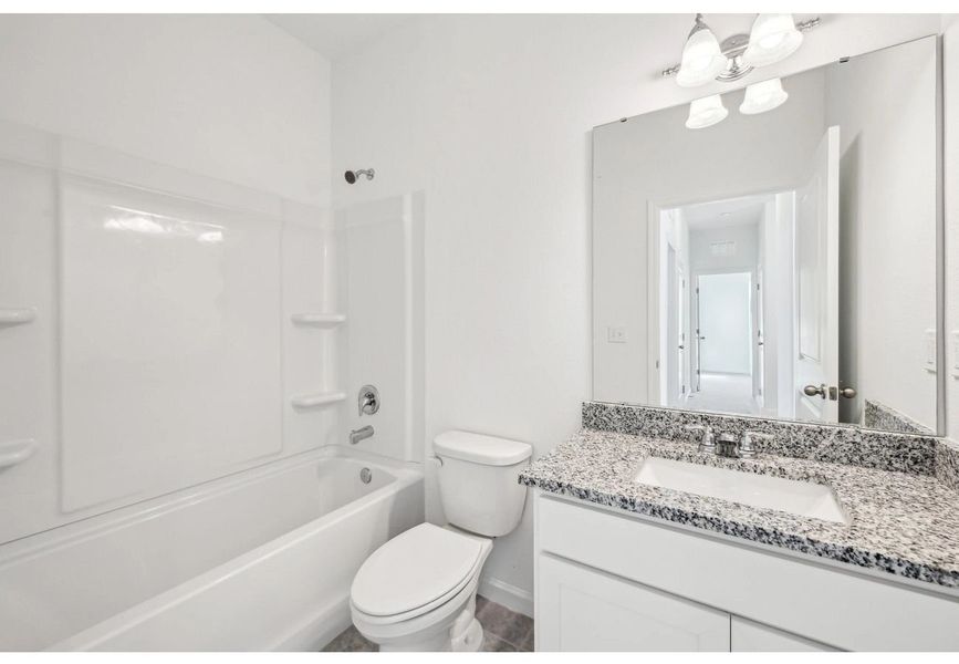 Furnished interior in a model home at Sunset Hills in Winter Haven (Image 16).