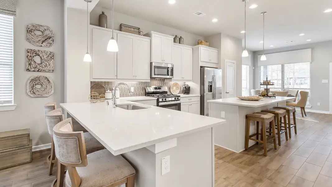 Furnished interior in a model home at Sunterra in Katy (Image 3).