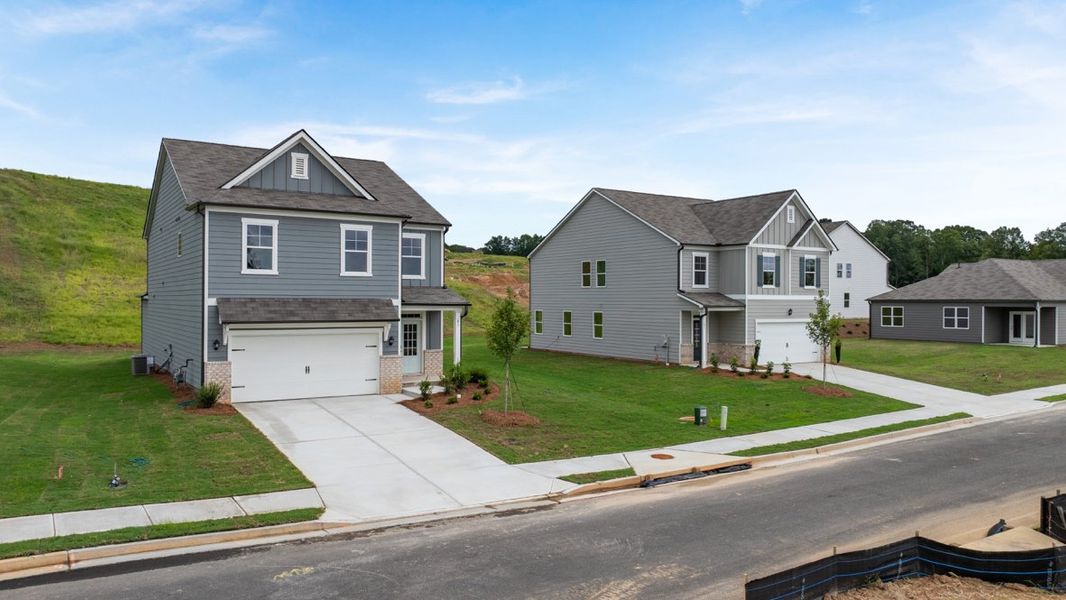Front exterior of a home in the Sheffield Highlands community, located in Dallas, GA (Image 14).