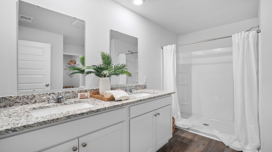 Furnished interior in a model home at The Groves at Bees Creek in Ridgeland (Image 21).