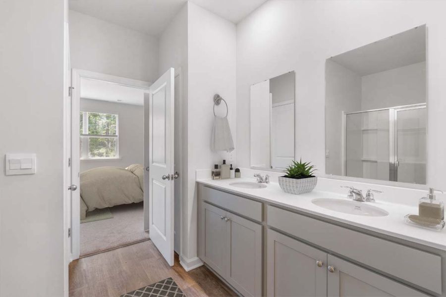 Furnished interior in a model home at The Retreat at East Argent in Ridgeland (Image 28).