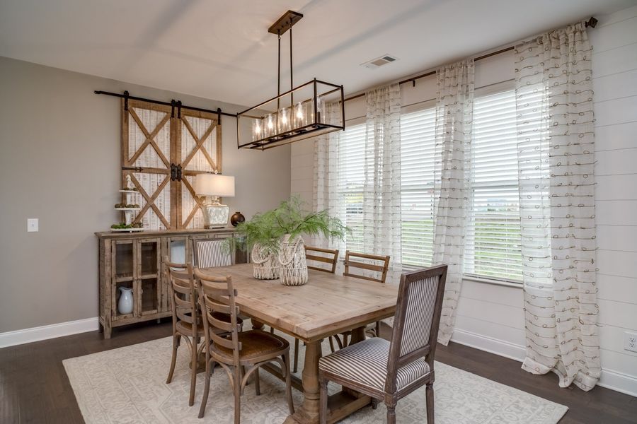Furnished interior in a model home at Harvest Point in Spring Hill (Image 24).