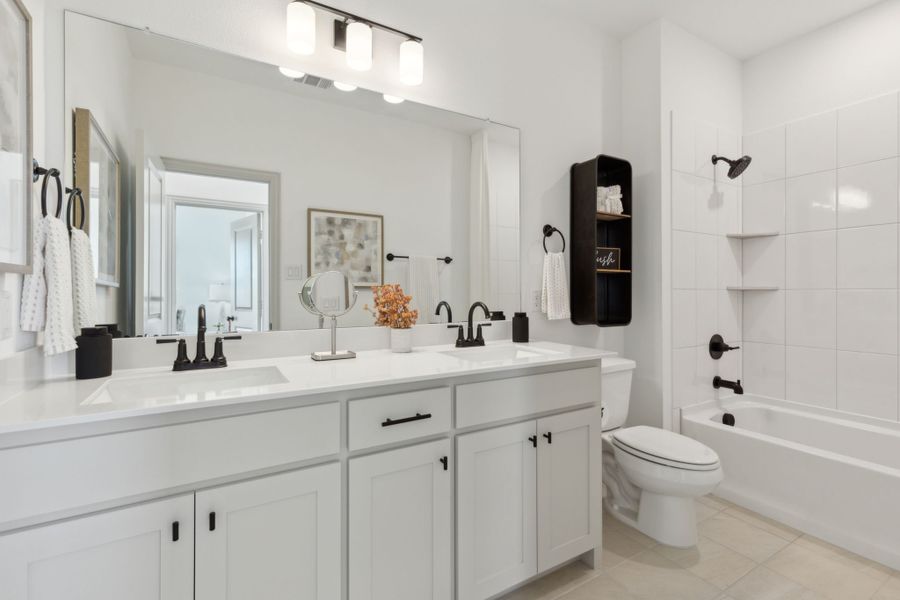 Furnished interior in a model home at The Village at Midtowne in Midlothian (Image 17).