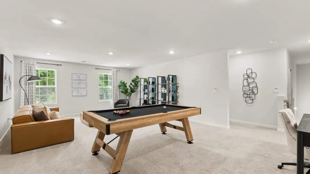 Furnished interior in a model home at Enclave at Stonewall Tell in South Fulton (Image 14).