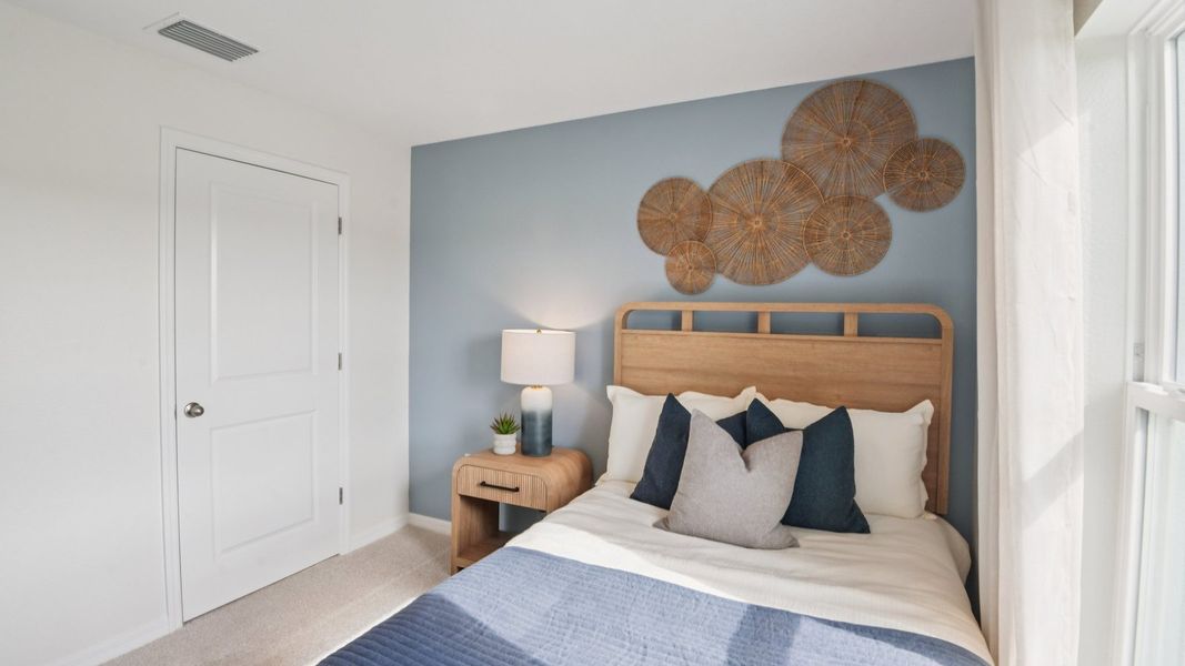 Furnished interior in a model home at Brighton Park in Hudson (Image 20).