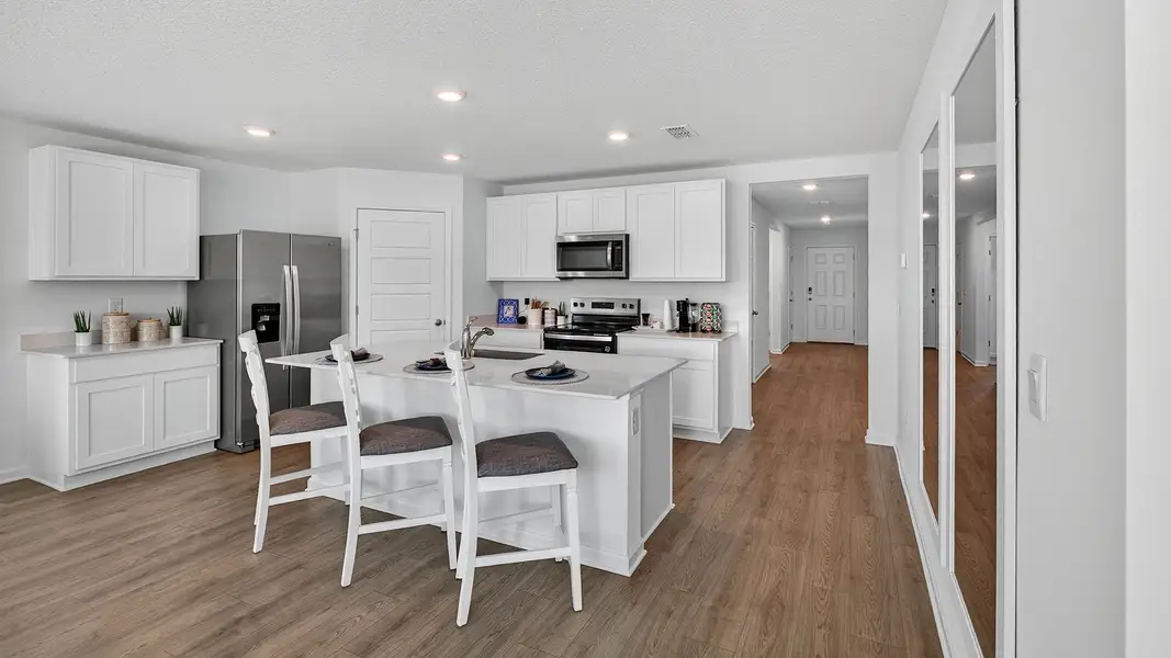 Furnished interior in a model home at Palm Coast Homesites in Palm Coast (Image 7).