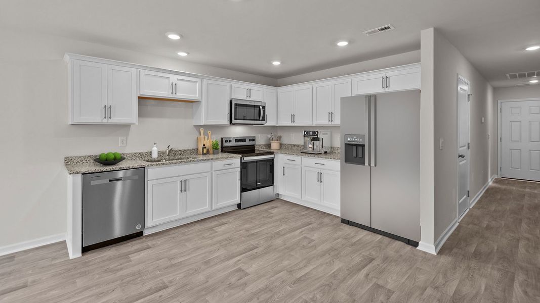 Furnished interior in a model home at Jetstream Park in Wilson (Image 5).