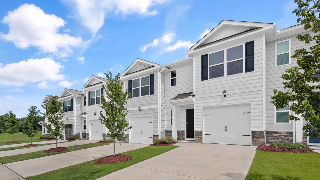 Front exterior of a home in the The Townes at Belle Grove community, located in Wendell, NC (Image 4).