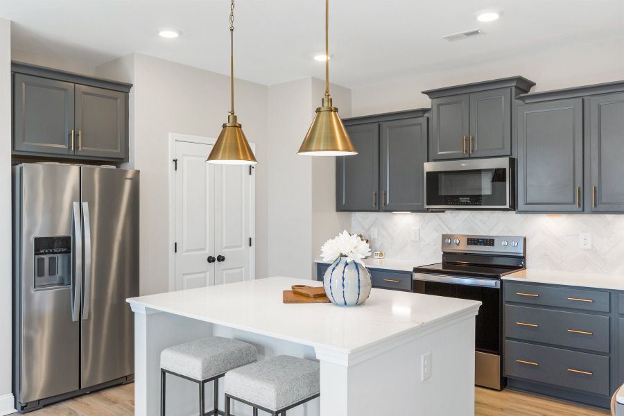 Furnished interior in a model home at Anchors Bend Townes in Wilmington (Image 26).