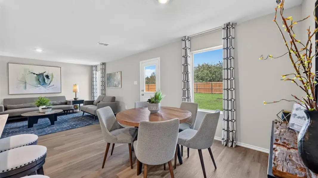 Furnished interior in a model home at The Wells in Mineral Wells (Image 9).