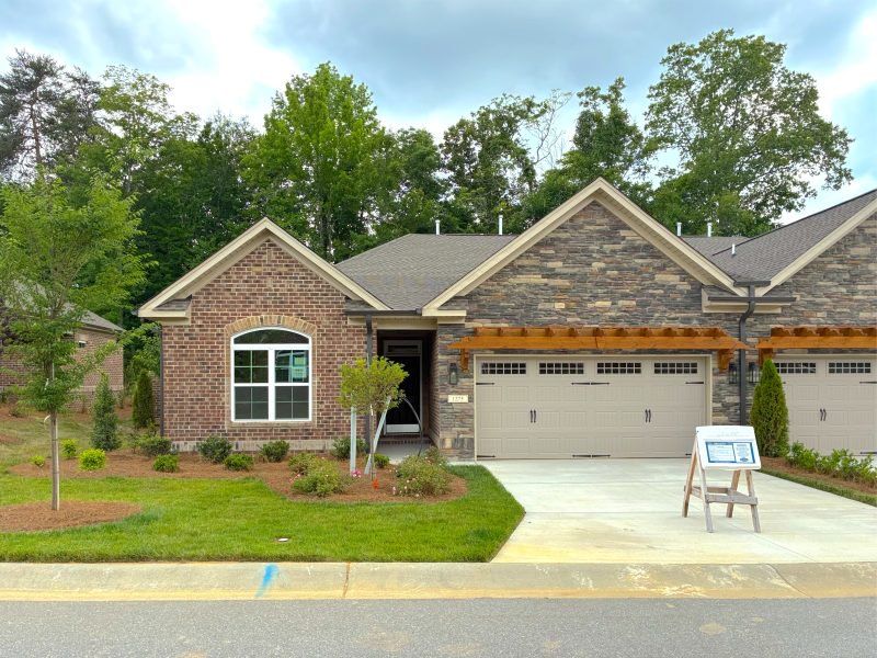 Front exterior of a home in the Weybridge community, located in Burlington, NC (Image 23).