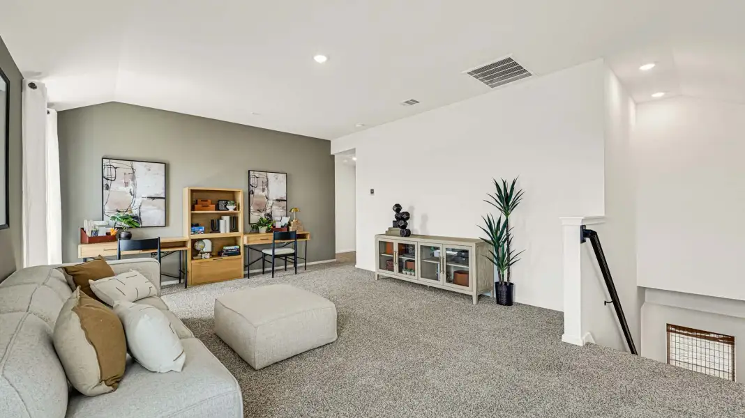 Furnished interior in a model home at Reverie Ranch in Arcola (Image 17).