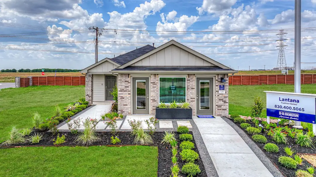 Front exterior of a home in the Lantana community, located in Lockhart, TX (Image 9).